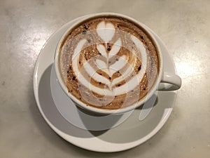Mocaccono. Mocha. Chocolate cafe. latte art. Close up. photo