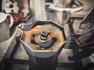 Mocha coffeepot maker stove defocused blur background