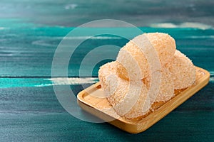 mochi or glutinous rice dumplings on wood table with copy space