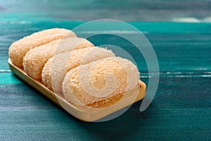 mochi or glutinous rice dumplings on wood table with copy space