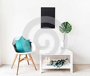 Mock up black board with decorations on white wall background