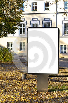 Mock up. Blank billboard outdoors, outdoor advertising, public information board stand at city park in autumn day