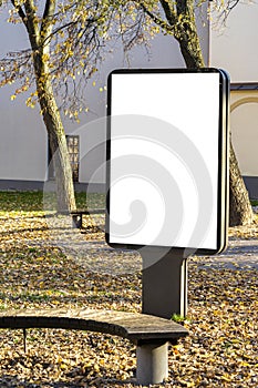 Mock up. Blank billboard outdoors, outdoor advertising, public information board stand at city park in autumn day
