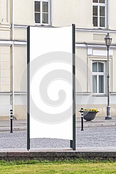 Mock up. Blank outdoor advertising column outdoors, public information board in the street.