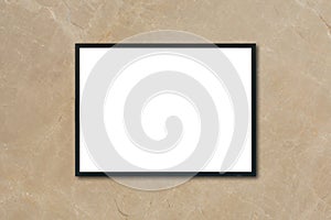 Mock up blank poster picture frame hanging on brown marble wall in room