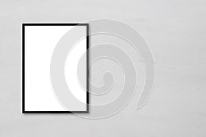 Mock up blank poster picture frame hanging on white marble wall background in room.