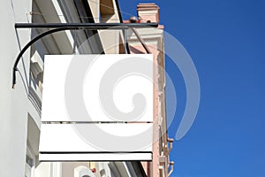 Mock up. Blank rectangular shape signboard on the wall of classical architecture building