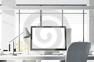 Mock up computer screen in white office