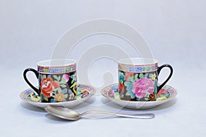 Mock up / design set of elegant and traditional colorful coffee cup & Tea cup on cup`s plate , drink-ware , kitchen isolated on wh