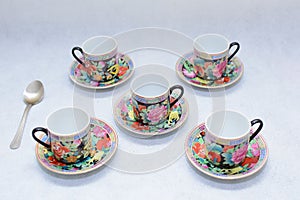 Mock up / design set of elegant and traditional colorful coffee cup & Tea cup on cup`s plate , drink-ware , kitchen isolated on wh