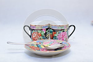 Mock up / design set of elegant and traditional colorful coffee cup & Tea cup on cup`s plate , drink-ware , kitchen isolated on wh