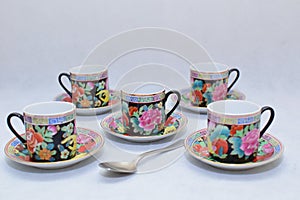 Mock up / design set of elegant and traditional colorful coffee cup & Tea cup on cup`s plate , drink-ware , kitchen isolated on wh