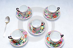 Mock up / design set of elegant and traditional colorful coffee cup & Tea cup on cup`s plate , drink-ware , kitchen isolated on wh