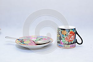 Mock up / design set of elegant and traditional colorful coffee cup & Tea cup on cup`s plate , drink-ware , kitchen isolated on wh