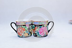 Mock up / design set of elegant and traditional colorful coffee cup & Tea cup on cup`s plate , drink-ware , kitchen isolated on wh