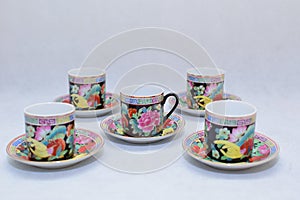 Mock up / design set of elegant and traditional colorful coffee cup & Tea cup on cup`s plate , drink-ware , kitchen isolated on wh