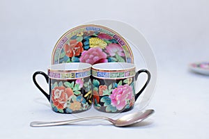Mock up / design set of elegant and traditional colorful coffee cup & Tea cup on cup`s plate , drink-ware , kitchen isolated on wh
