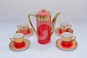 Mock up / design set of elegant and traditional colorful Red and gold traditional elegant coffee cup & Tea cup on cup`s plate besi