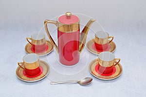 Mock up / design set of elegant and traditional colorful Red and gold traditional elegant coffee cup & Tea cup on cup`s plate besi