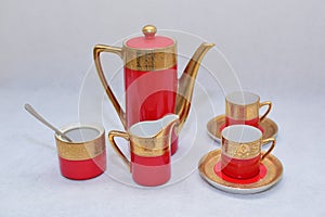 Mock up / design set of elegant and traditional colorful Red and gold traditional elegant coffee cup & Tea cup on cup`s plate besi