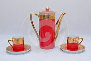 Mock up / design set of elegant and traditional colorful Red and gold traditional elegant coffee cup & Tea cup on cup`s plate besi