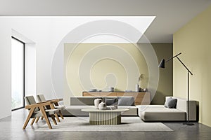 Mock up empty copy space wall. Modern living room interior. Stone floor and stylish furniture. Concept of contemporary design