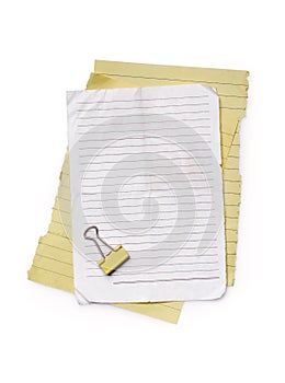 Mock up of empty lined paper sheets with yellow clip