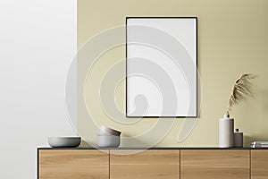 Mock up empty poster on the wall. Modern living room interior. Stylish furniture. Concept of contemporary design