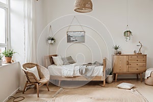 Mock up frame in children room with natural wooden furniture, Scandi Boho style interior background,