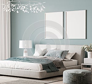 Mock up frame in luxury bright bedroom design, modern white bed and elegant home accessories