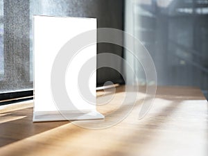 Mock up Menu frame on Table in Restaurant Cafe Shop