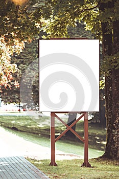 Mock up. Outdoor advertising, blank billboard outdoors, public information board in the park