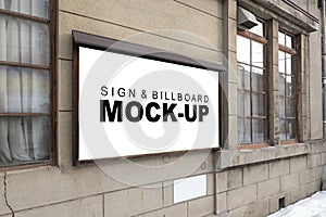 Mock up outdoor billboard on the wall near glass windows