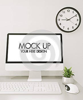 Mock up poster computer in office zen style and decoration on top table office.3D rendering
