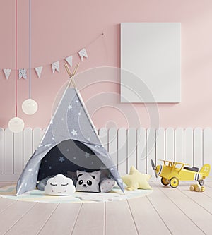 Mock up poster frame in children room with kids tent on pink wall background