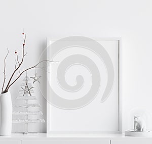 Mock up poster frame with Christmas decoration in home interior, Scandinavian style photo