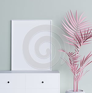 Mock up poster frame with pastel pink plant in interior background