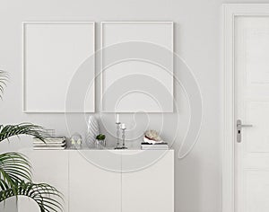 Mock-up posters in home interior with chest of drawers and plant near door