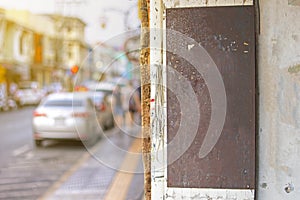 Mock up of rusty metal vintage shop sign board with blank space, classic style outdoor sign to add company logo. Hanging on vintag