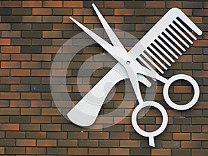 Hairdressing: scissors and comb emblem hanging on a brick wall photo