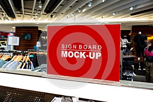 Mock up signboard in fashion clothes shop in shopping mall