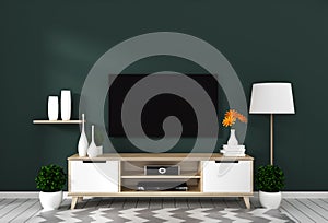 Mock up Smart Tv with blank screen hanging on the wall dark green on white wooden floor mockup. 3d rendering