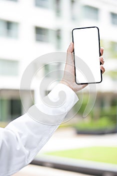 Mock-up smartphone blank screen , Close-uphand holding blank screen smartphone