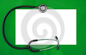 Mock up and stethoscope on green surgery background in diagnosis and treatment medical healthcare concept with copy space