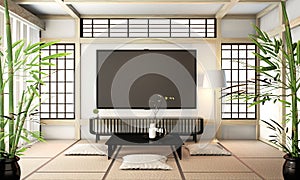 Mock up Tv room, smart tv on wall zen room very japanese stye and tatami floor.3D rendering