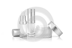 Mock-up two empty container pump bottles and a cream jar for skincare is uncover, isolated on white background.