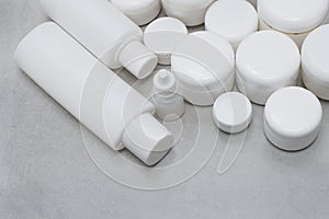 Mock up. Unbranded white plastic containers for skincare products