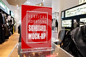 Mock up vertical advertising billboard at fashion clothing shop