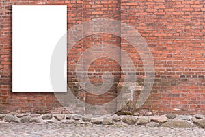 Mock up. Vertical blank billboard, advertising, public information board on old red brick wall