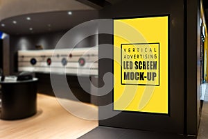 Mock up vertical LED screen at entrance IT Shop